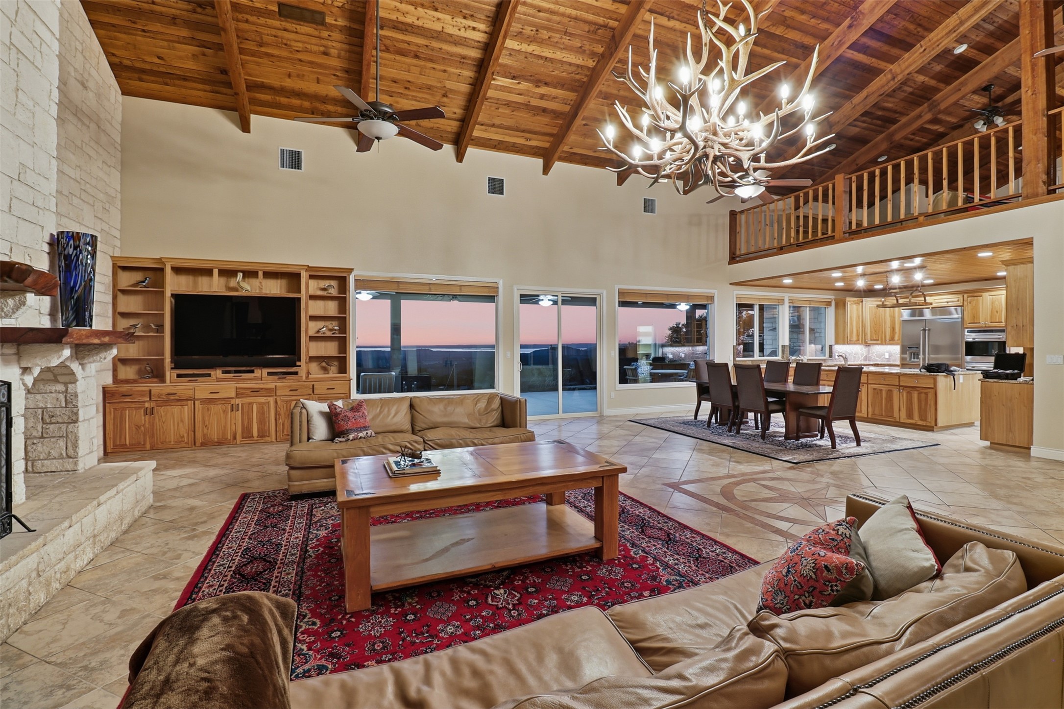 450 Threadgill Ranch Road Burnet, TX 78611 - Photo 29 of 33 a living room with furniture and a flat screen tv