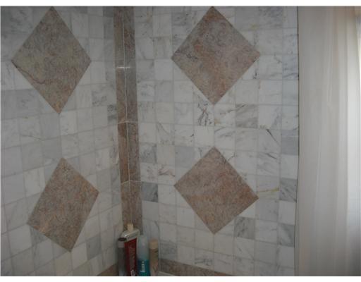 413 Windsor Road Augusta, ME 04330 - Photo 11 of 25 Bathroom. Marble tile shower and tub...