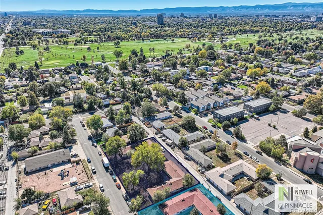an aerial view of a city with lots of residential buildings