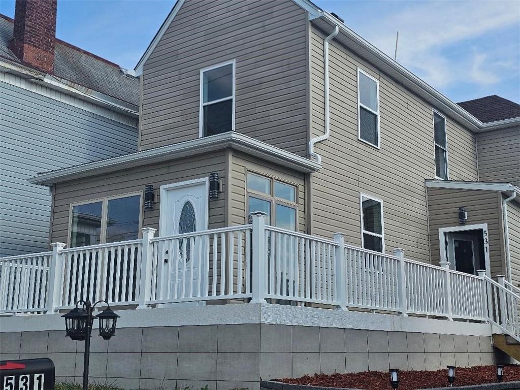 531 Reno Street Rochester, PA 15074 - Photo 2 of 11 a front view of a house with a porch