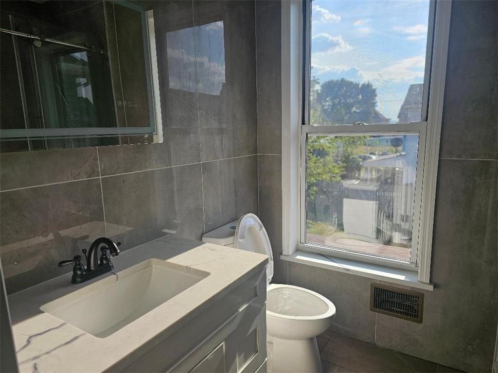 531 Reno Street Rochester, PA 15074 - Photo 9 of 11 a bathroom with a sink toilet and shower