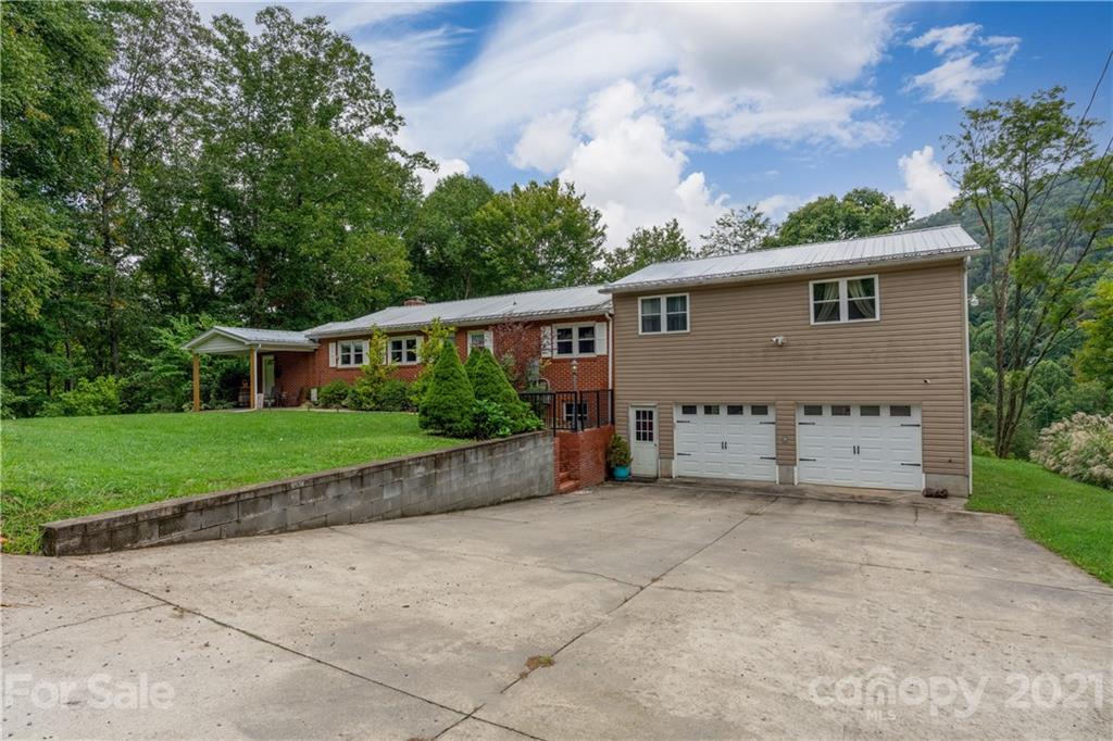 188 Stewart Road Waynesville, NC 28786 - Photo 5 of 45 a view of a house with a yard