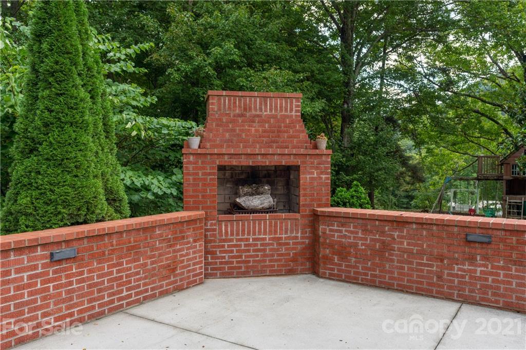 188 Stewart Road Waynesville, NC 28786 - Photo 6 of 45 a backyard of a house with lots of green space