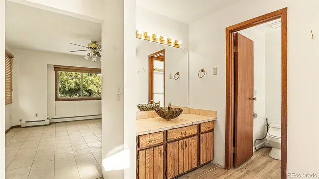 a view of a bathroom from the hallway