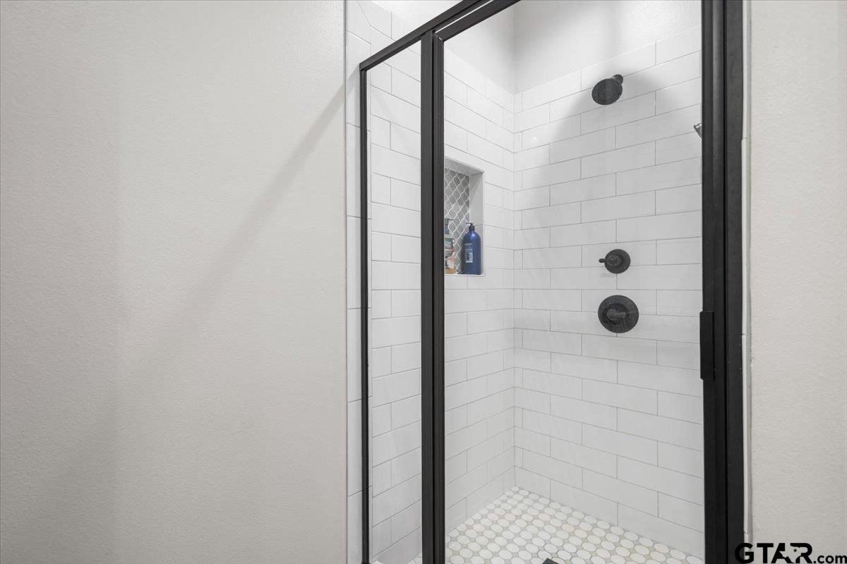 9235 Farm To Market Road 851 Rusk, TX 75785 - Photo 22 of 47 a bathroom with a shower