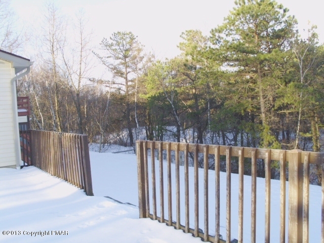 7229 Clover Road Long Pond, PA 18334 - Photo 17 of 22 a view of a wooden fence