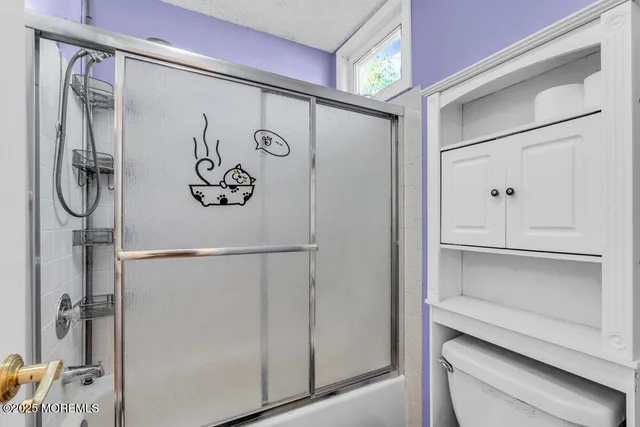 a white refrigerator freezer sitting inside of a kitchen