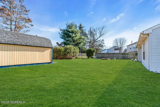 a view of a backyard with a garden
