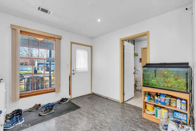 a room with furniture and window