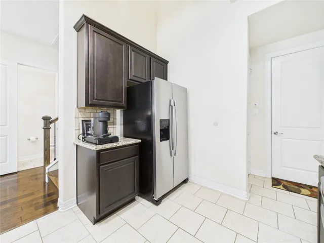 a view of a hallway with seating area