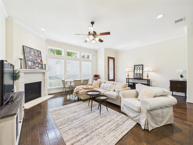 a kitchen with granite countertop a stove a sink and a microwave