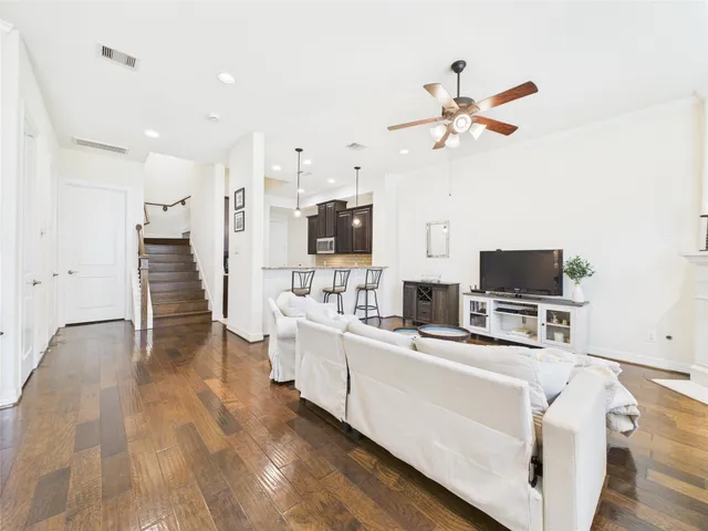 a kitchen with granite countertop stainless steel appliances and sink
