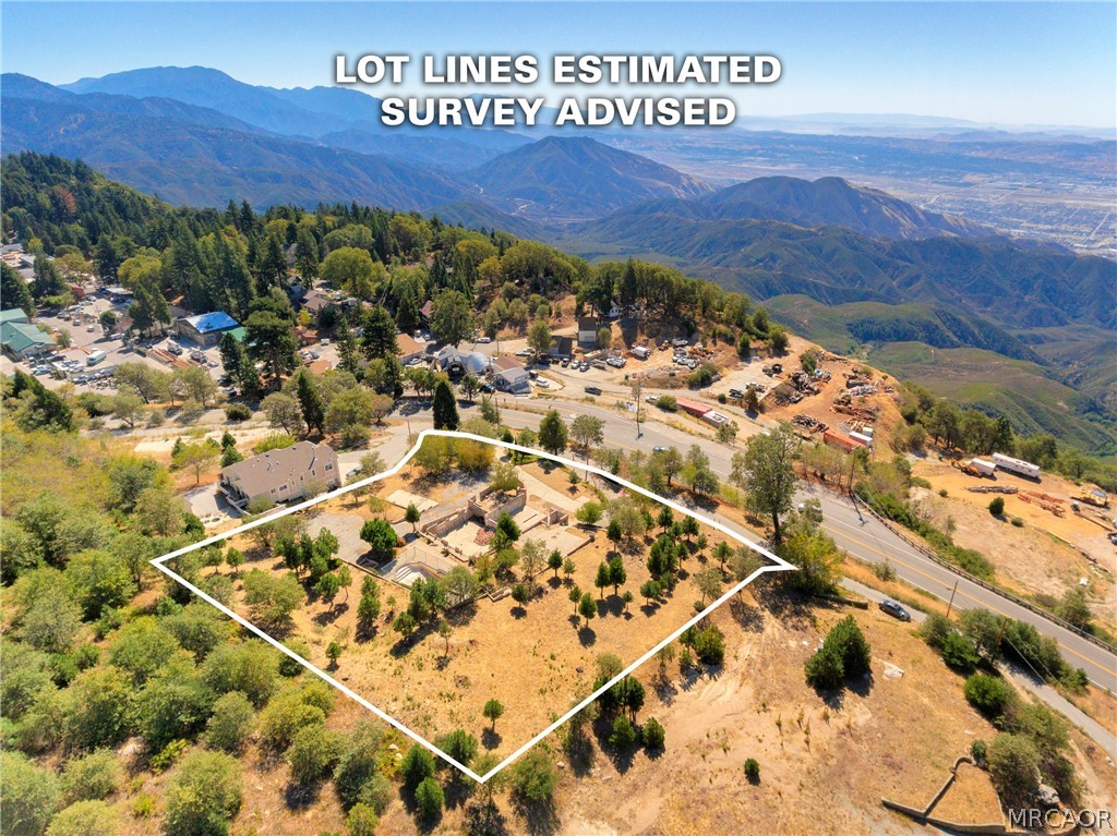 26262 Highway 18 Rimforest, CA 92378 - Photo 2 of 24 a view of a tennis court