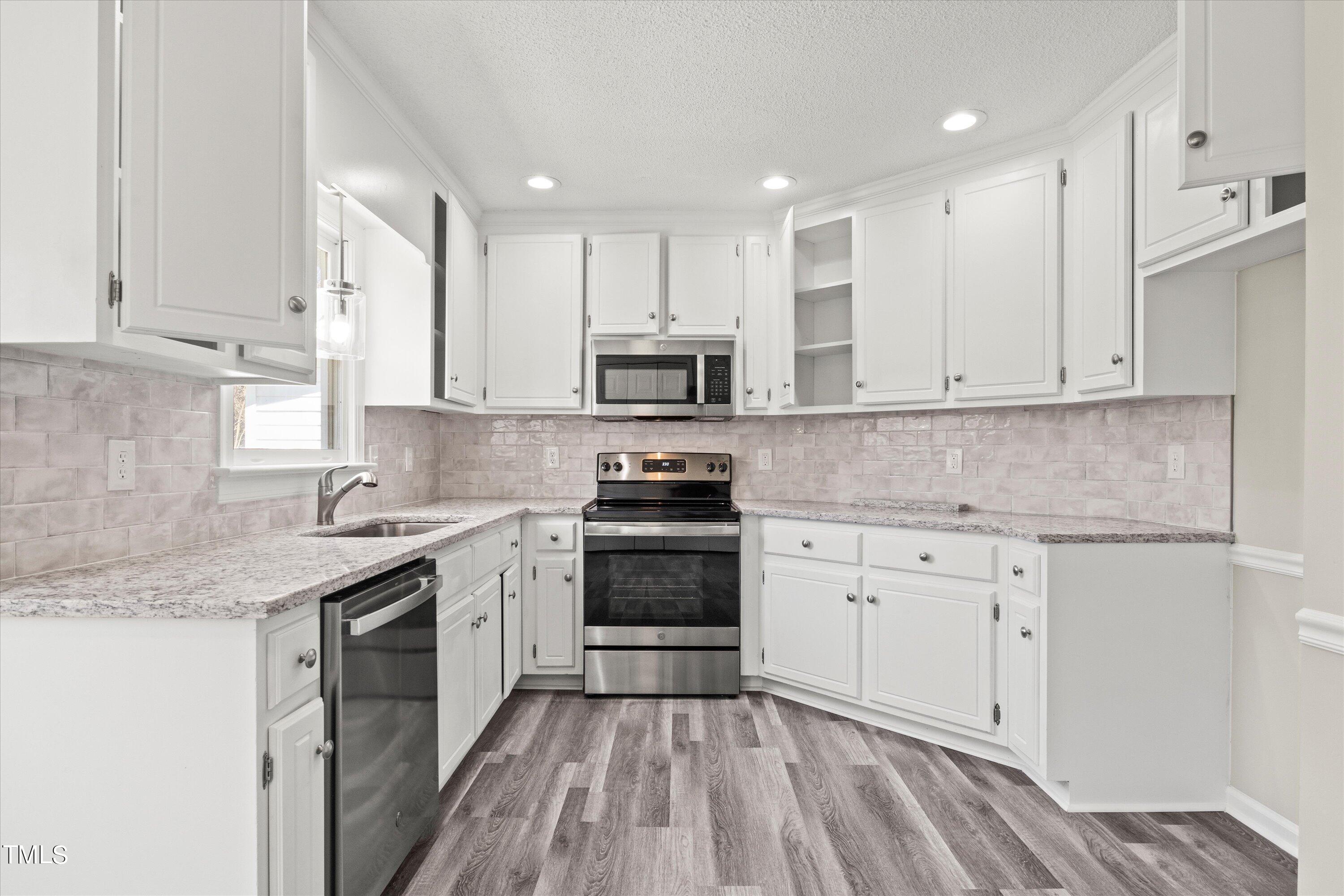 9033 Ferrell Road Zebulon, NC 27597 - Photo 2 of 35 19-9033 Ferrell Rd20230320_0019