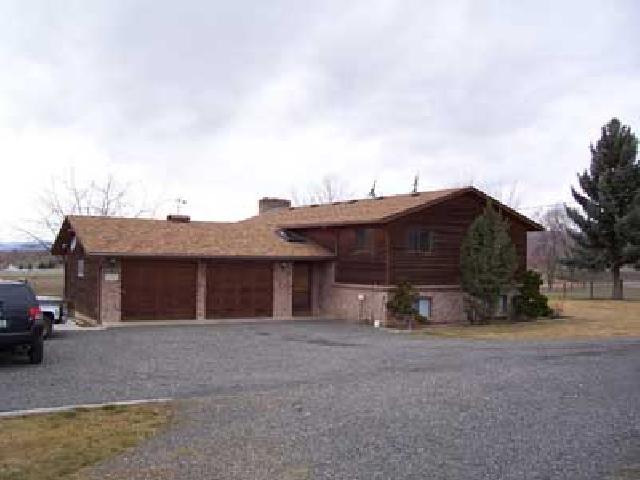9450 Bittner Road Yakima, WA 98901 - Photo 1 of 9 a view of a house with a yard