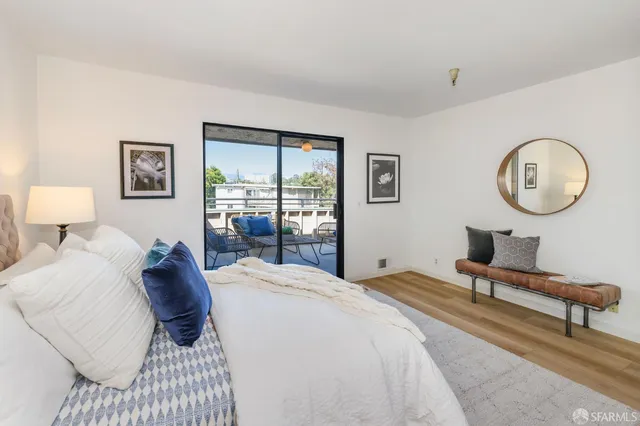a view of a chairs and table in patio