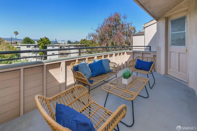 a view of a terrace with furniture