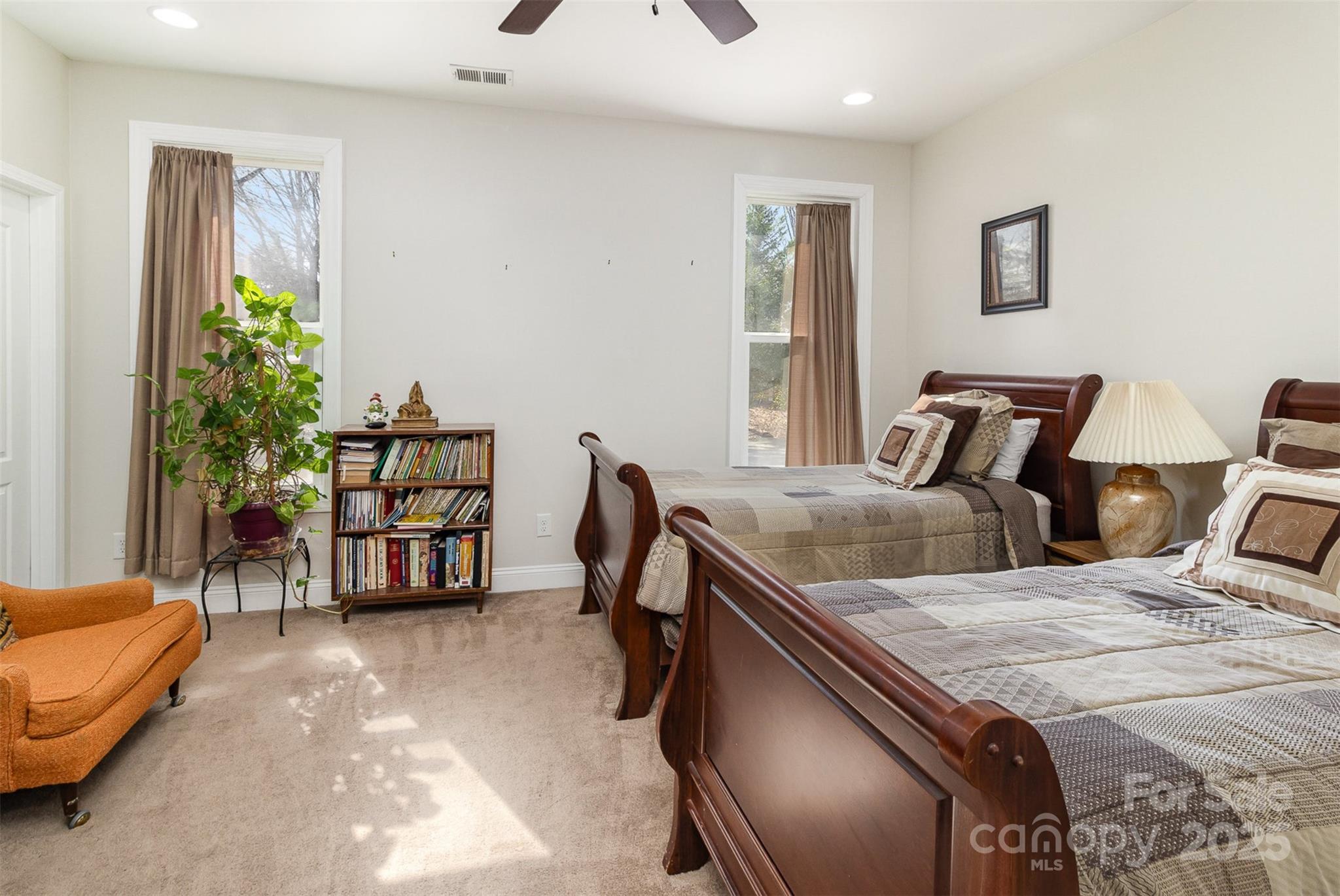 4321 Rolling Acres Road Charlotte, NC 28213 - Photo 13 of 22 a bedroom with furniture and a bed