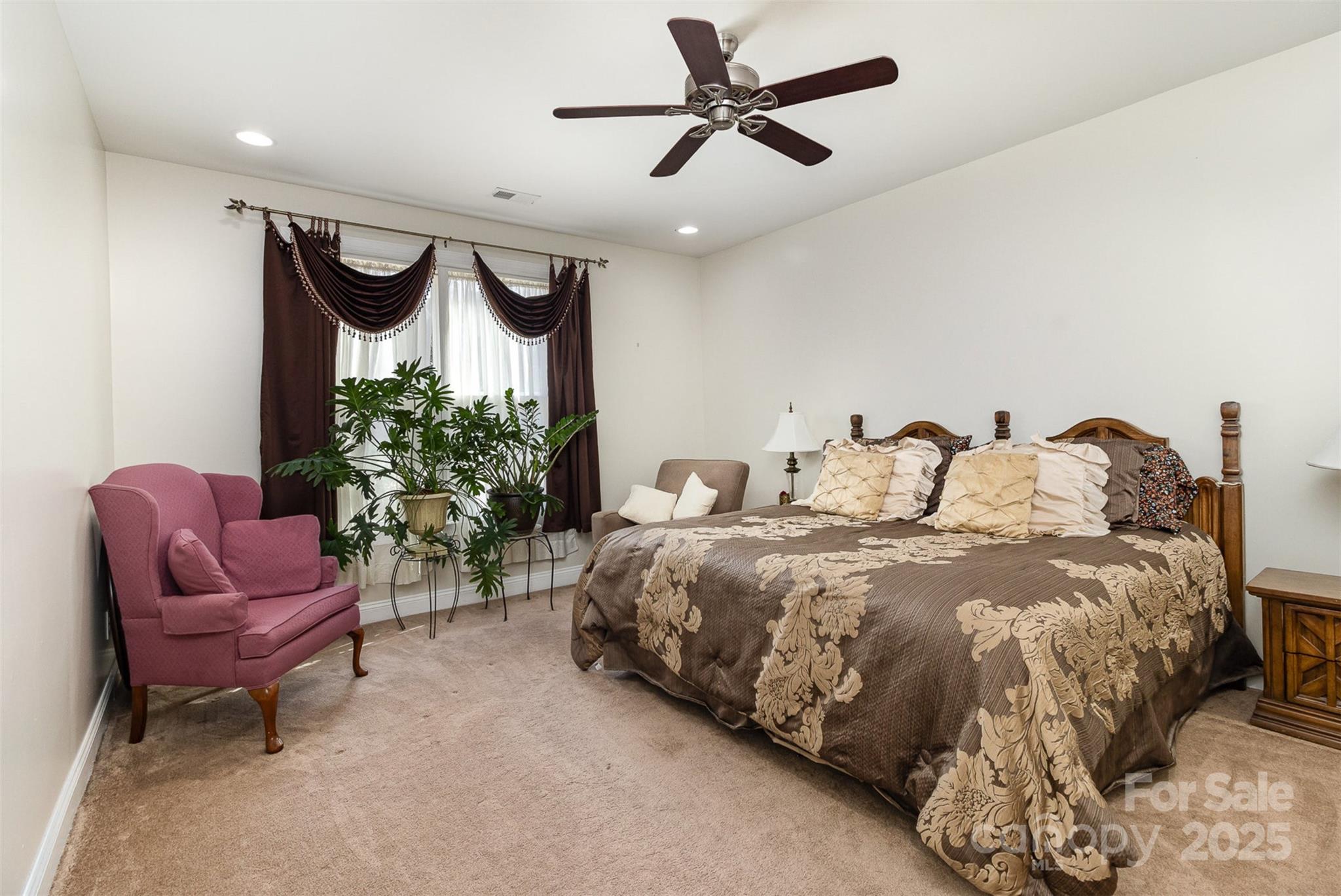 4321 Rolling Acres Road Charlotte, NC 28213 - Photo 15 of 22 a bedroom with bed and a chairs