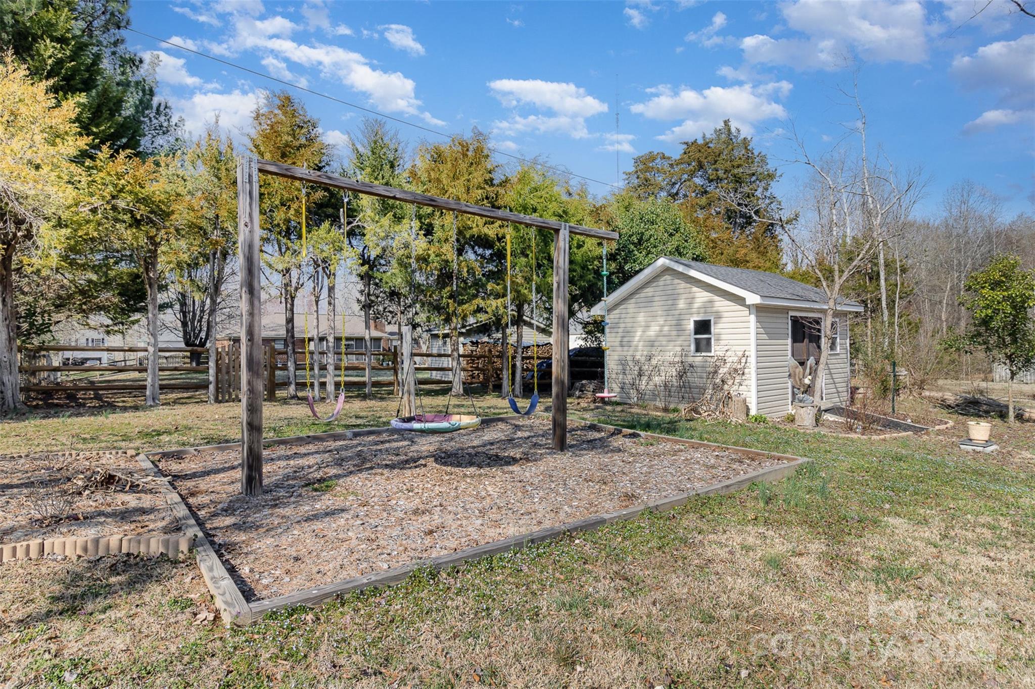 4321 Rolling Acres Road Charlotte, NC 28213 - Photo 20 of 22 a view of a house with backyard
