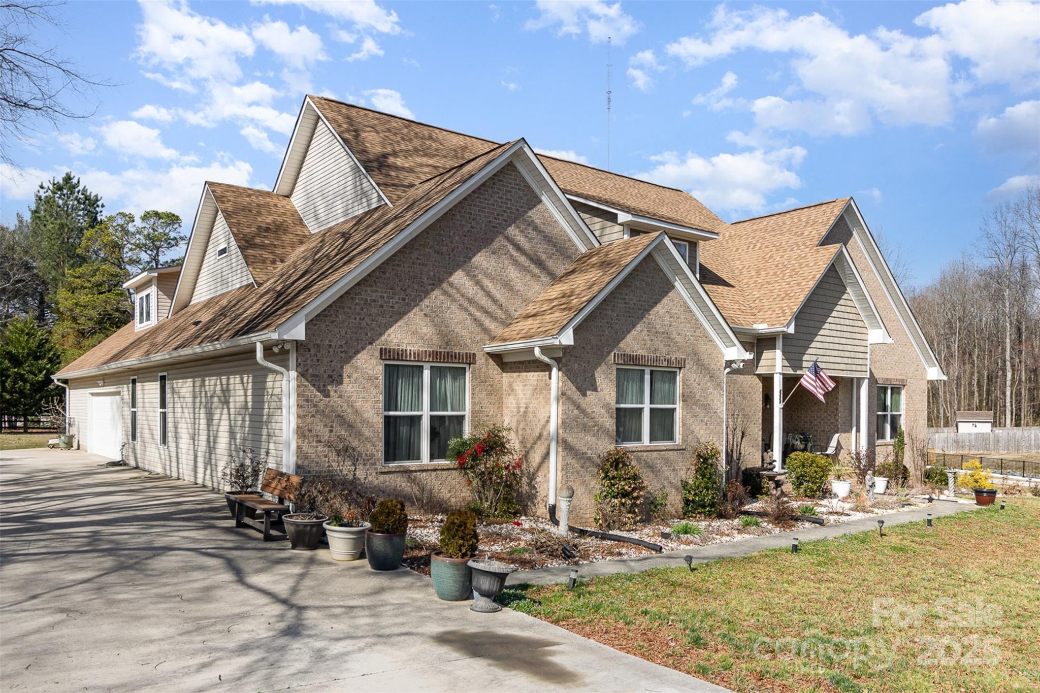 4321 Rolling Acres Road Charlotte, NC 28213 - Photo 2 of 22 a view of a house with backyard and chairs