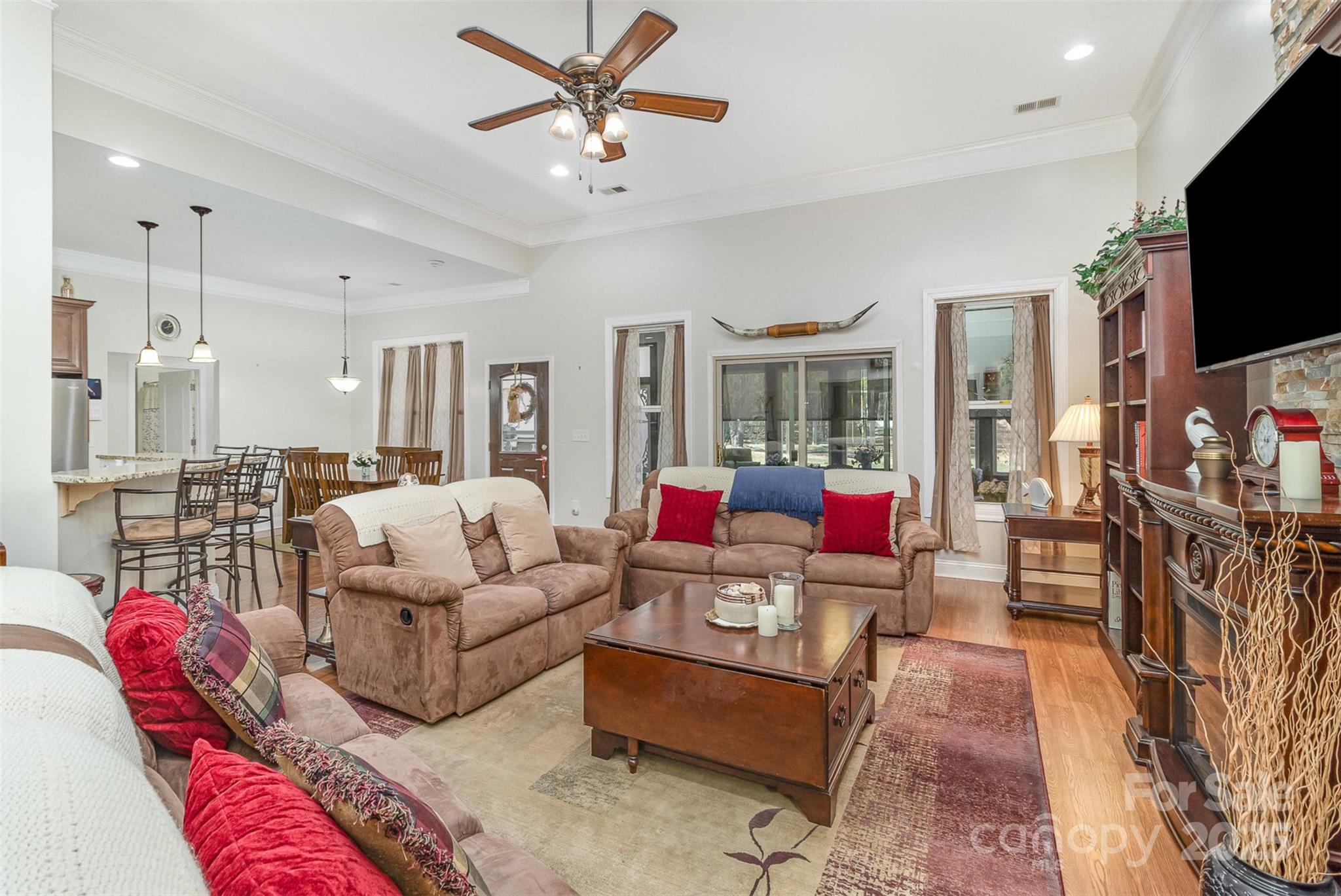 4321 Rolling Acres Road Charlotte, NC 28213 - Photo 4 of 22 a living room with furniture and a flat screen tv