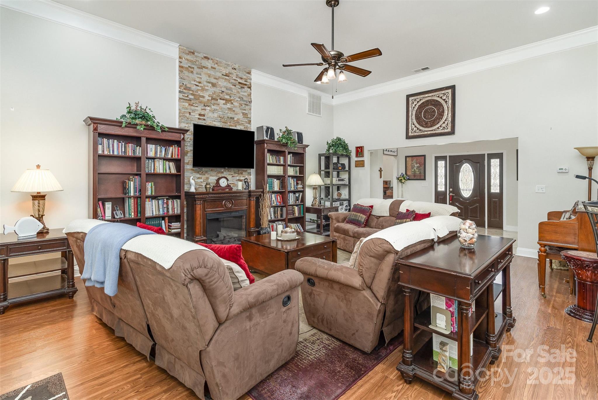 4321 Rolling Acres Road Charlotte, NC 28213 - Photo 5 of 22 a living room with fireplace furniture and a flat screen tv