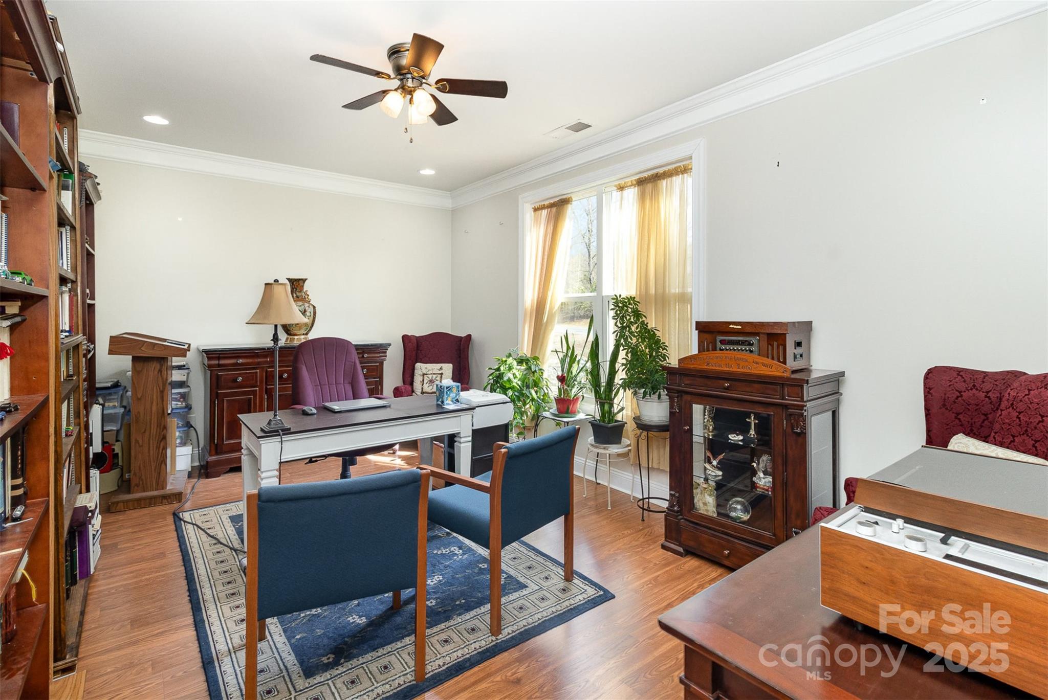 4321 Rolling Acres Road Charlotte, NC 28213 - Photo 6 of 22 a living room with furniture a fireplace and a window
