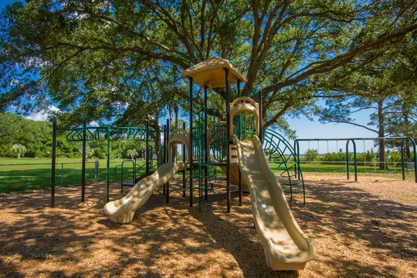 a view of a park with a slide