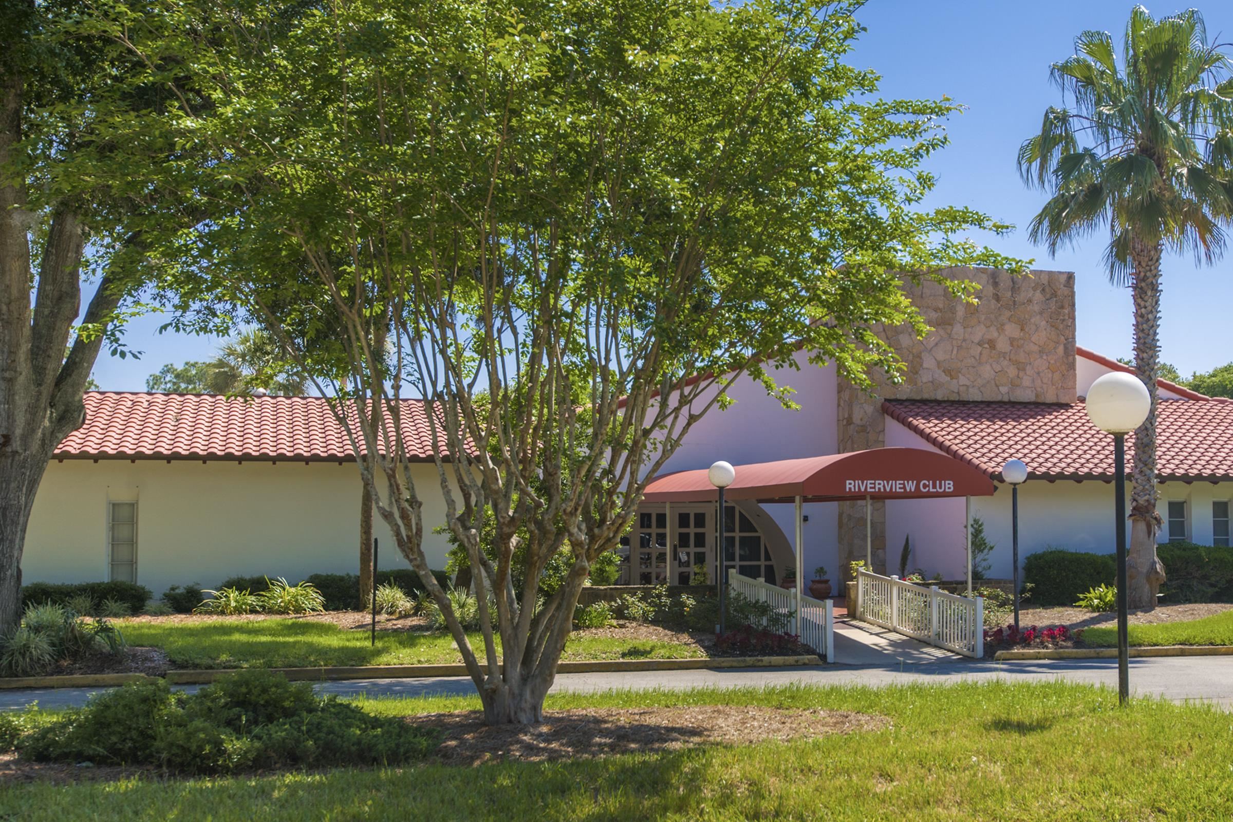 354 Shores Boulevard St. Augustine, FL 32086 - Photo 32 of 34 a front view of a house with garden