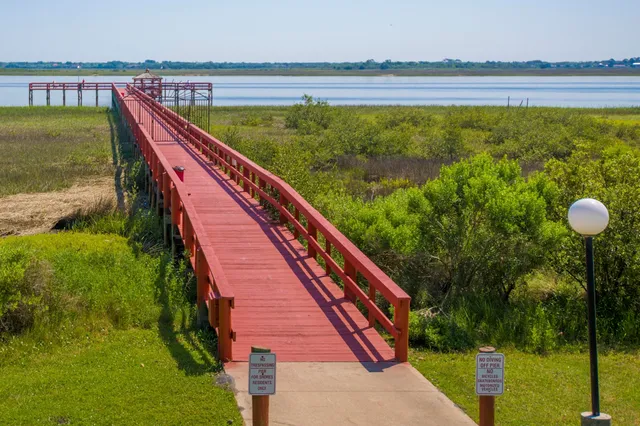 a view of swimming pool from a balcony