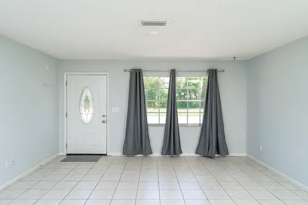 an empty room with window