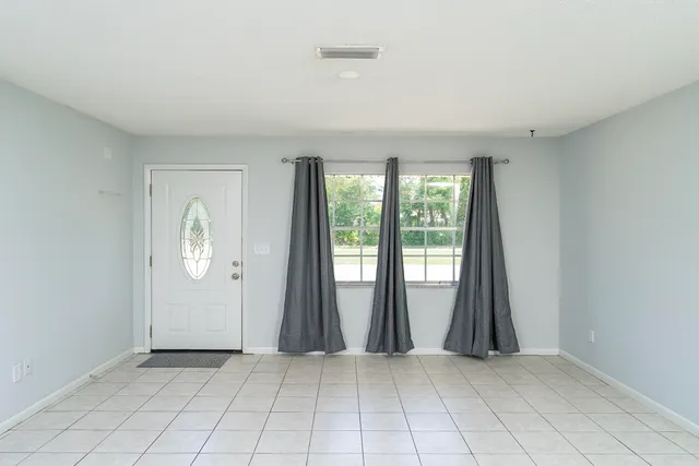 an empty room with window