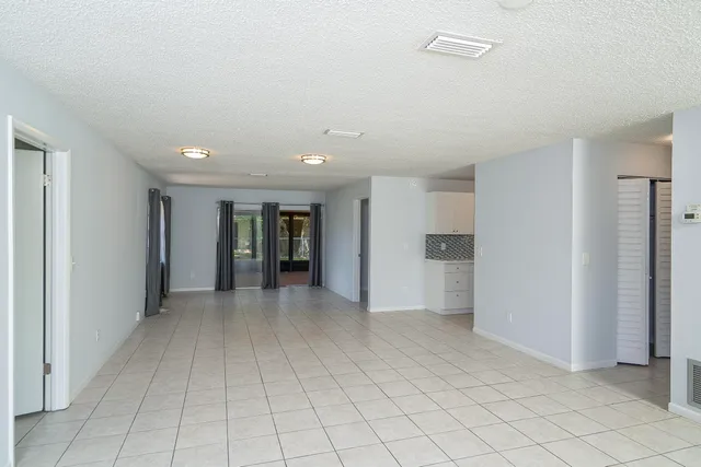 a view of an empty room with window