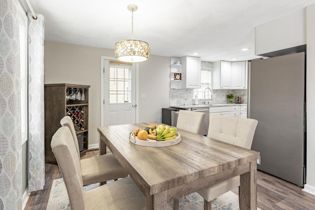 3 Elginwood Road, Unit B Peabody, MA 01960 - Photo 11 of 30 a view of a dining room with furniture window and wooden floor