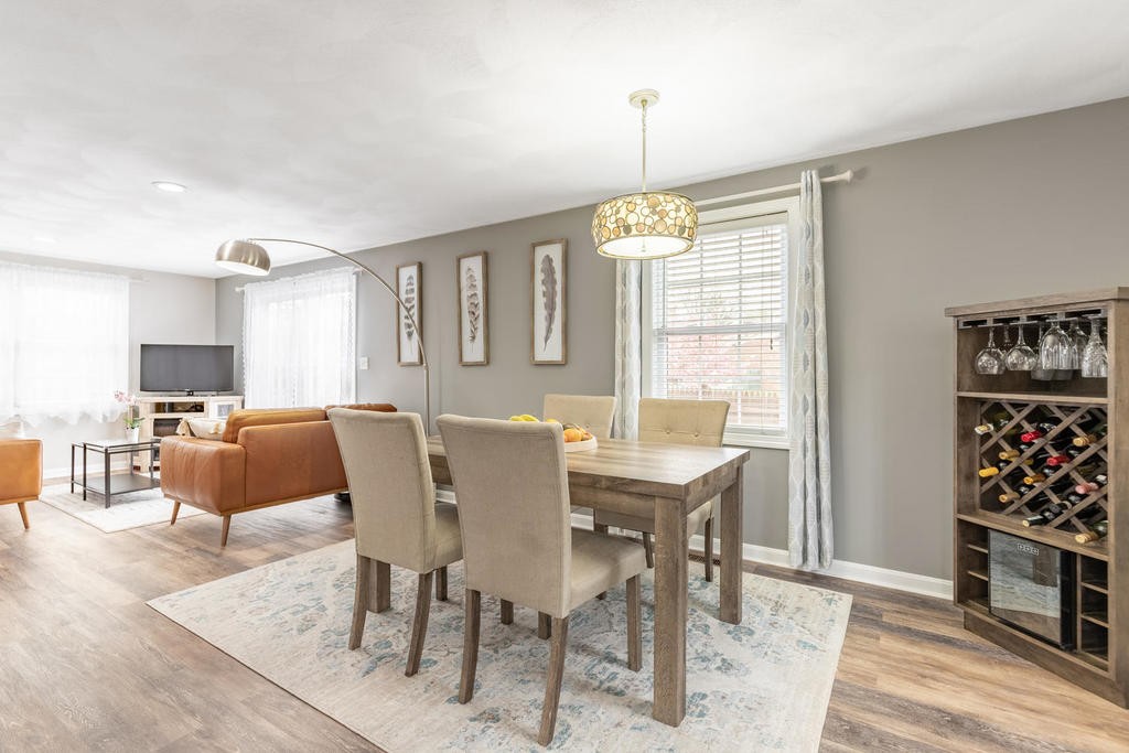 3 Elginwood Road, Unit B Peabody, MA 01960 - Photo 13 of 30 a view of a dining room with furniture window and wooden floor