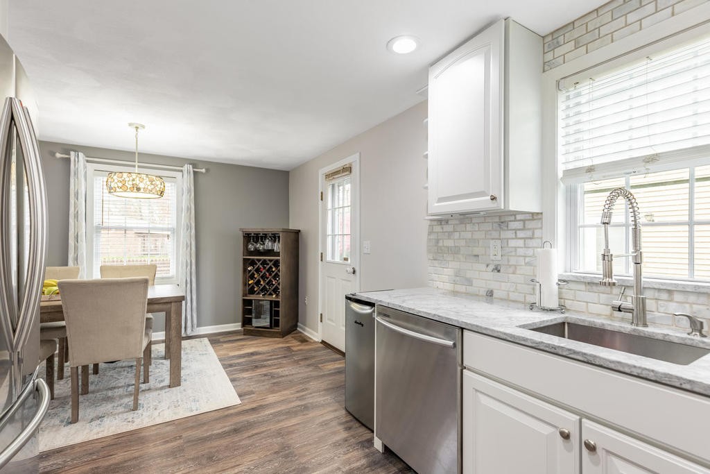 3 Elginwood Road, Unit B Peabody, MA 01960 - Photo 16 of 30 a kitchen with a sink cabinets and window