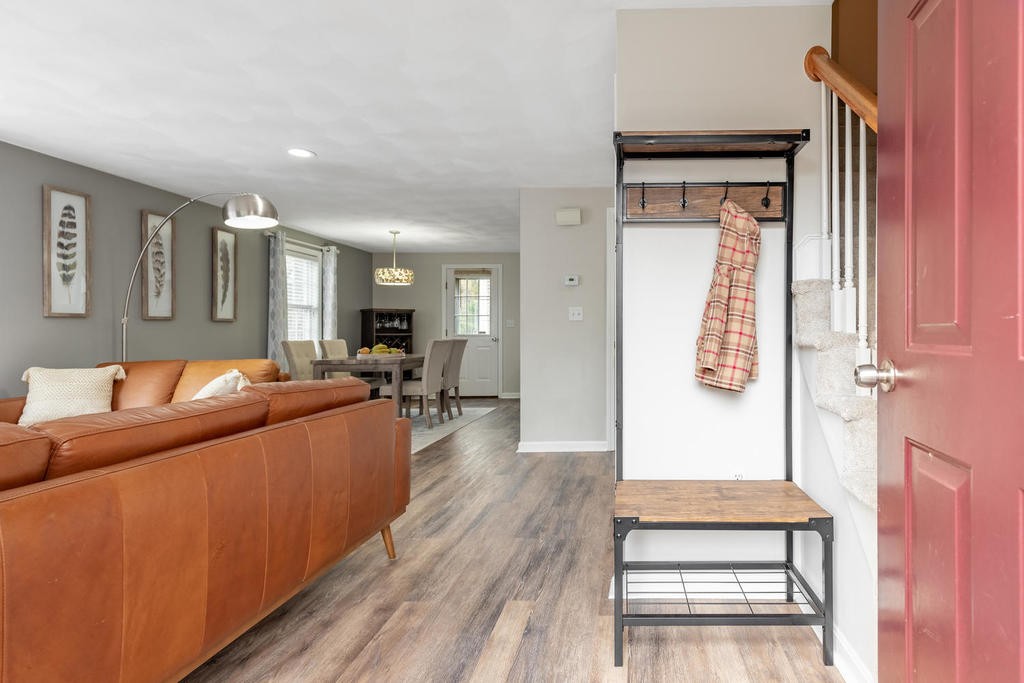 3 Elginwood Road, Unit B Peabody, MA 01960 - Photo 2 of 30 a living room with furniture and a wooden floor