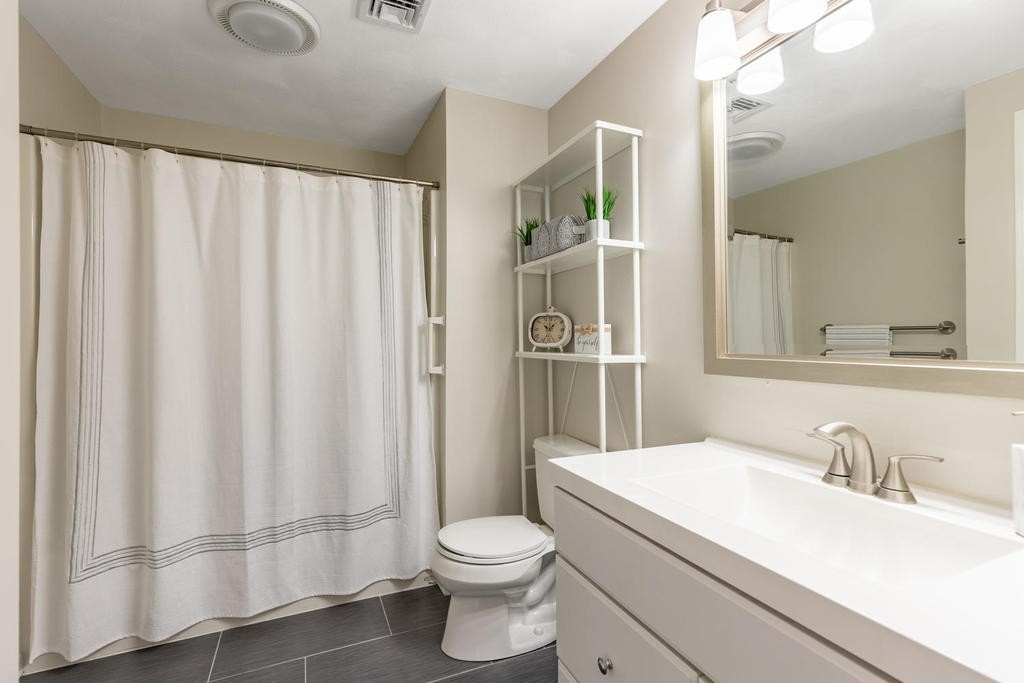 3 Elginwood Road, Unit B Peabody, MA 01960 - Photo 21 of 30 a bathroom with a sink toilet and shower