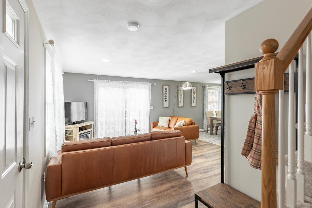 3 Elginwood Road, Unit B Peabody, MA 01960 - Photo 3 of 30 a living room with furniture and a window