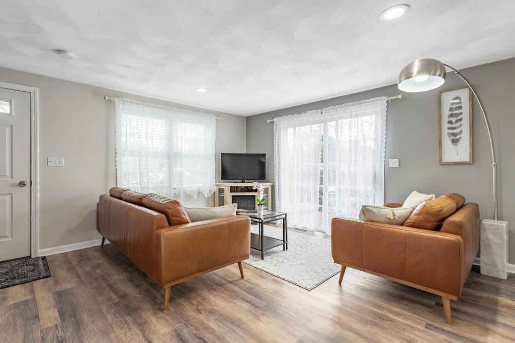 3 Elginwood Road, Unit B Peabody, MA 01960 - Photo 5 of 30 a living room with furniture wooden floor and a large window