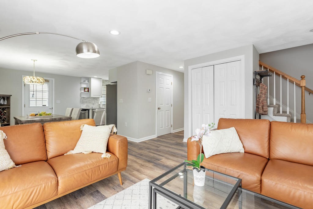 3 Elginwood Road, Unit B Peabody, MA 01960 - Photo 6 of 30 a living room with furniture and a dining table