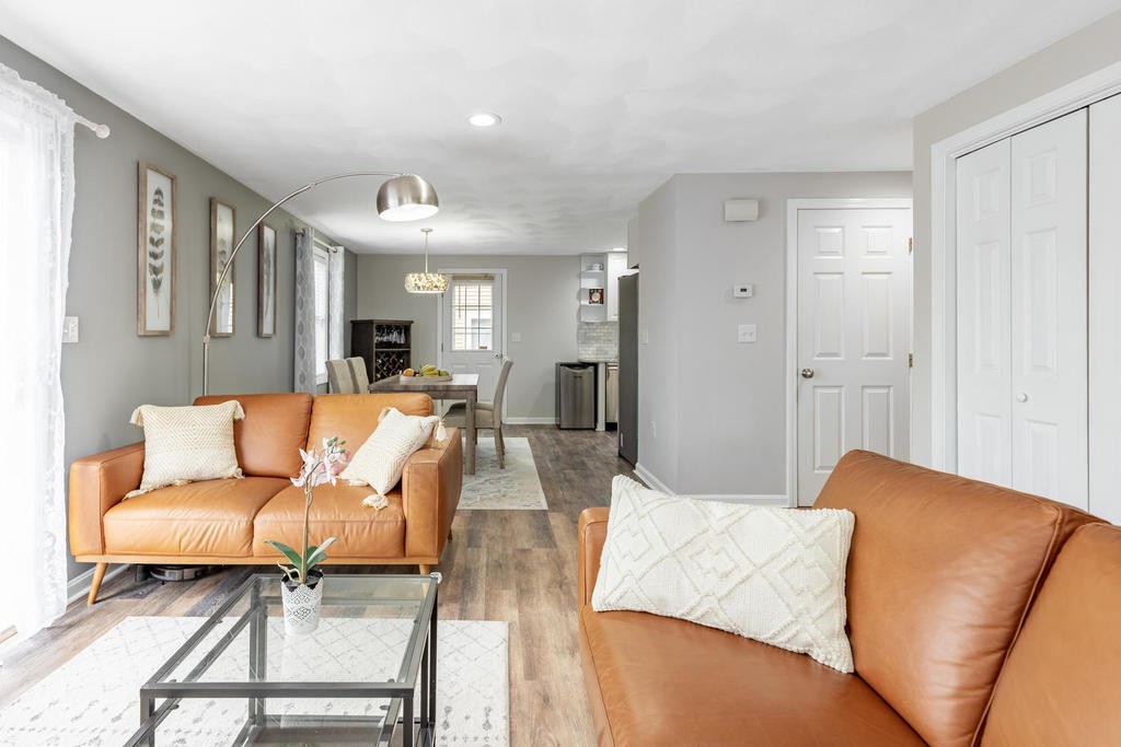 3 Elginwood Road, Unit B Peabody, MA 01960 - Photo 7 of 30 a living room with furniture and wooden floor