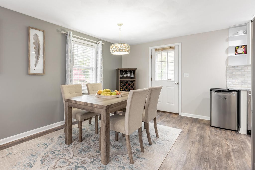 3 Elginwood Road, Unit B Peabody, MA 01960 - Photo 10 of 30 a view of a dining room with furniture window and wooden floor