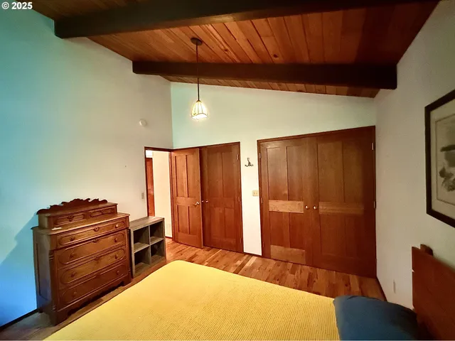 a bedroom with furniture and closet