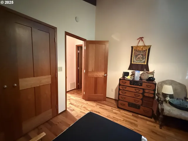 a bed room with a bed and furniture