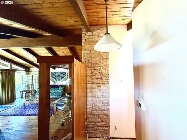 a bathroom with a shower and a sink