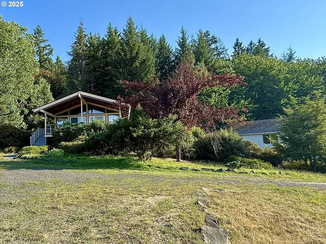 a backyard of a house with lots of green space