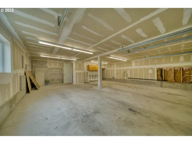 a view of a room with wooden roof