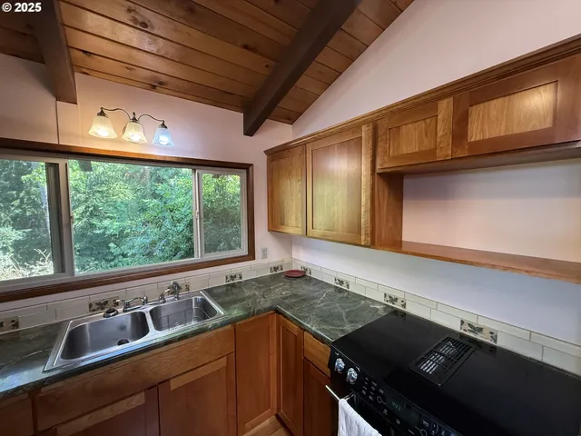 a kitchen with a large stove and cabinets